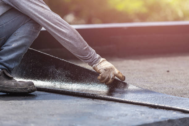 Professional Exterior Waterproofing technician working in Butler, KY